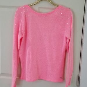 Long sleeve pink sweater.